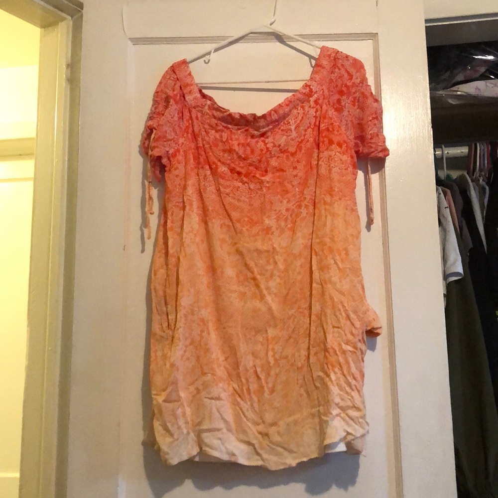orange and yellow long top with sinched  sleeves
